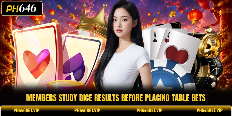 Members study dice results before placing table bets